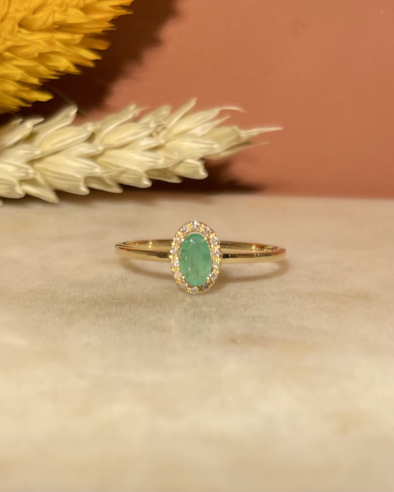 "Carlotta" Emerald & 14 Diamond Daisy Ring