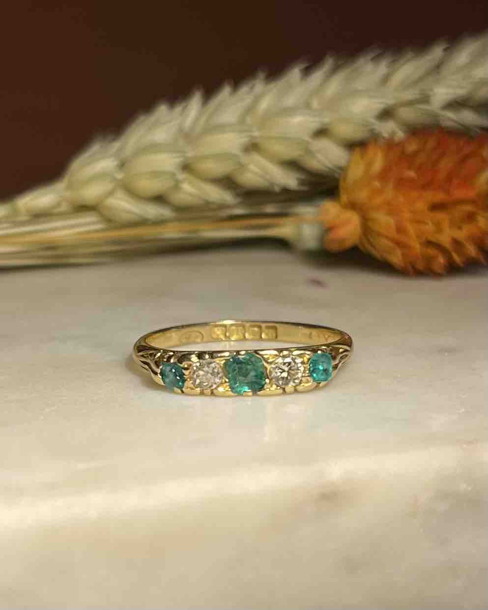 "Belen" emerald and diamond river ring