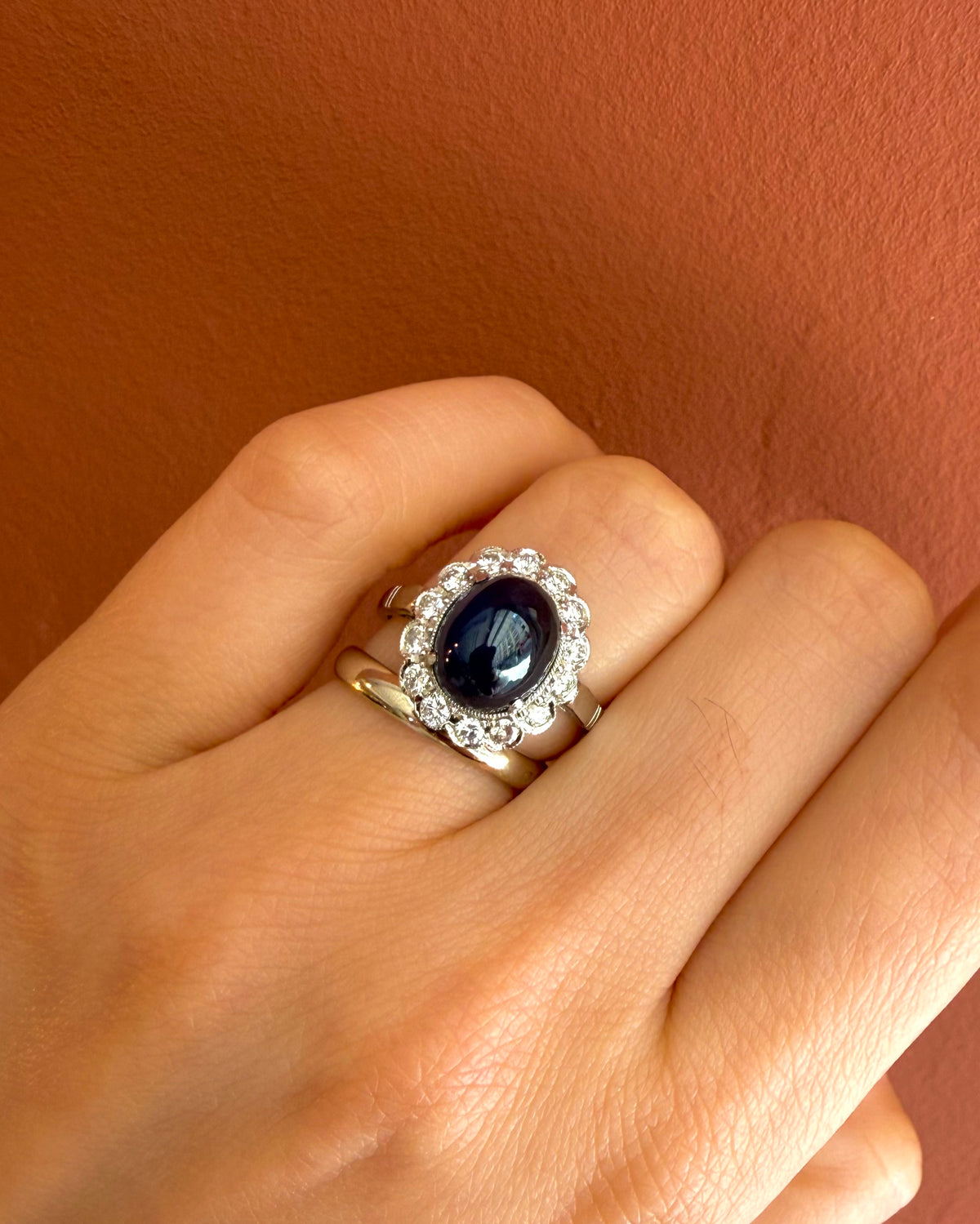 “Patricia” Marguerite ring with a 5.25-carat cabochon sapphire and 0.42-carat diamonds