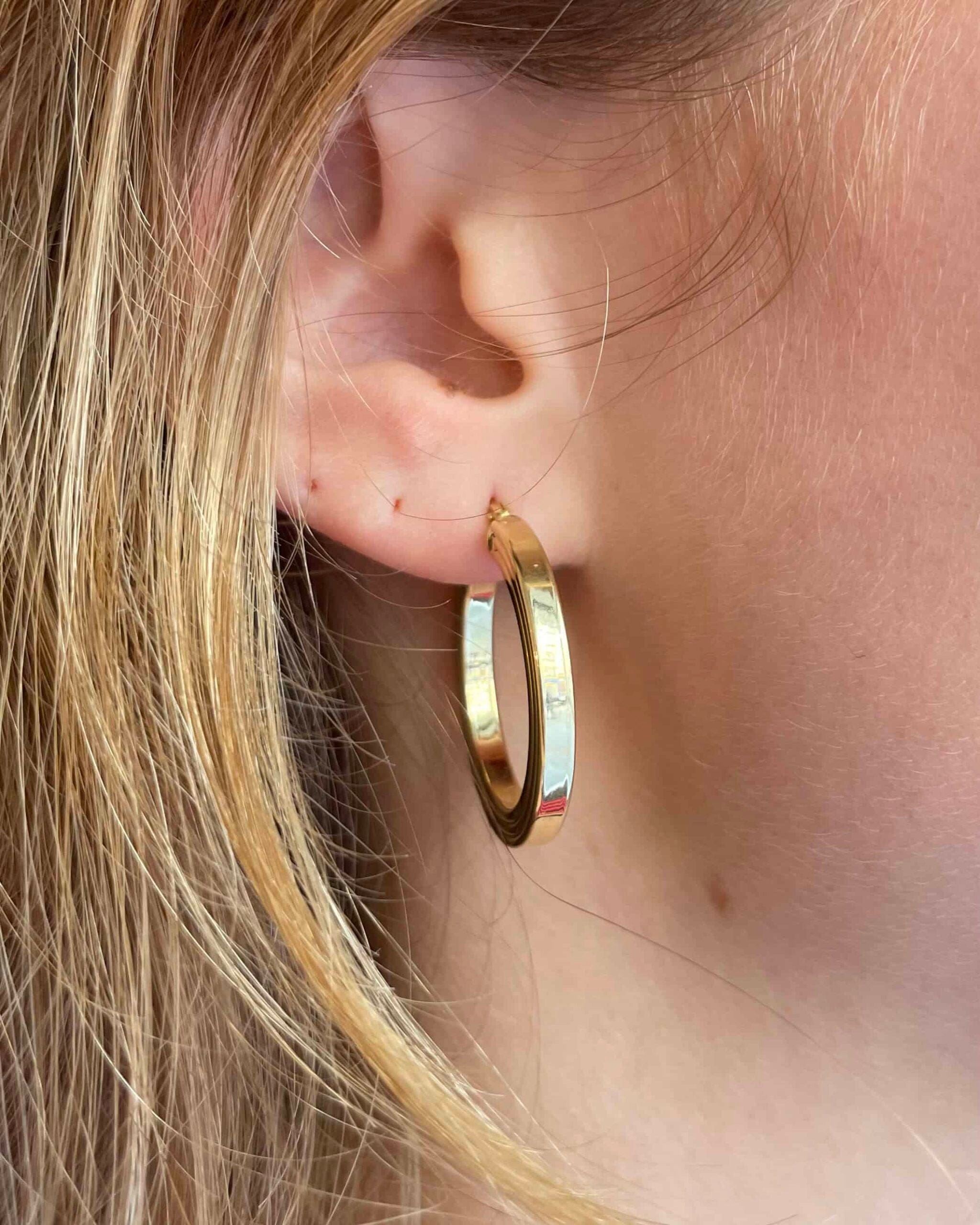 Aros vintage "Trixie" de oro amarillo de 18 quilates