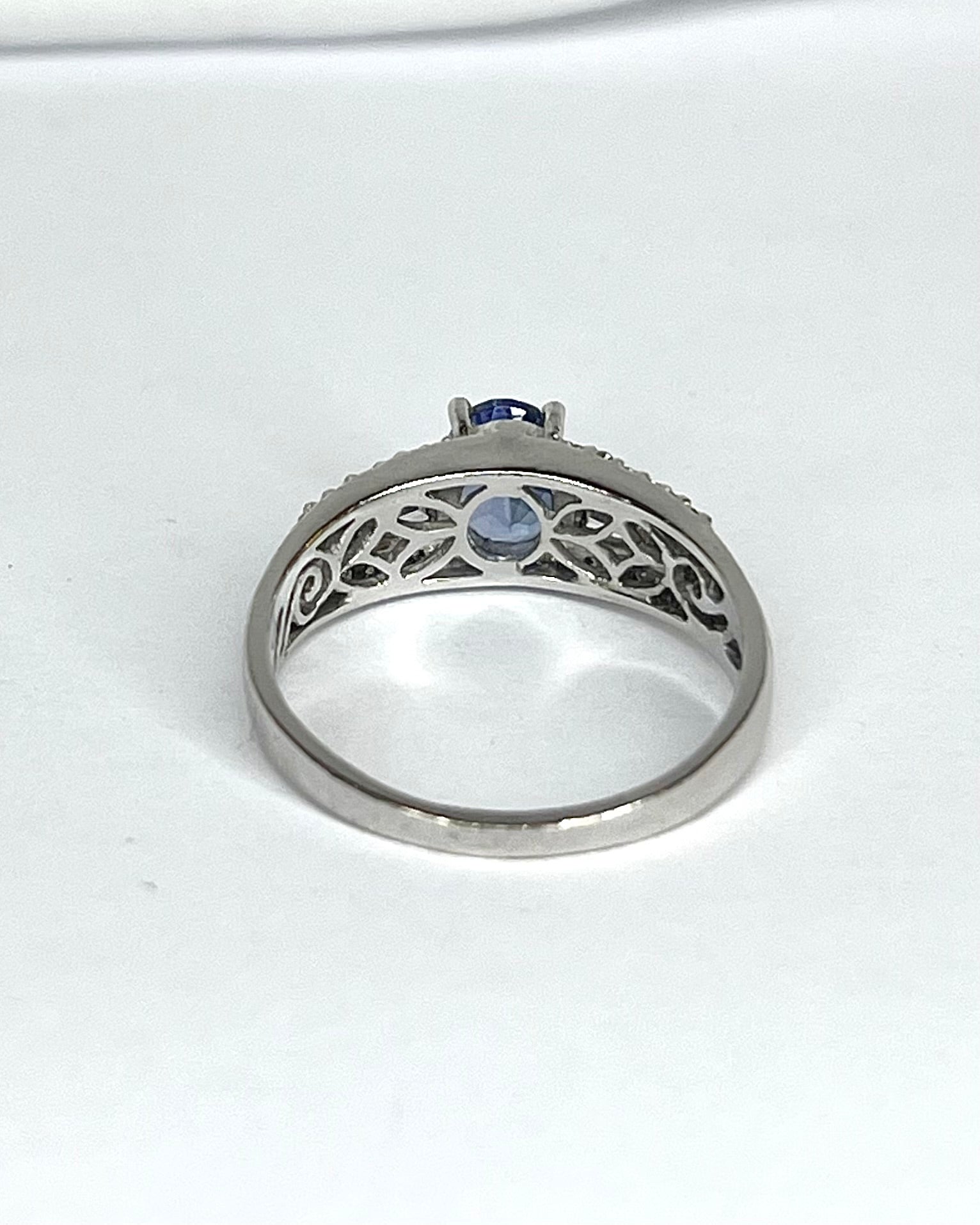 Anillo Solitario Tanzanita 1.10 quilates y Diamantes 0.44 quilates "Línea"