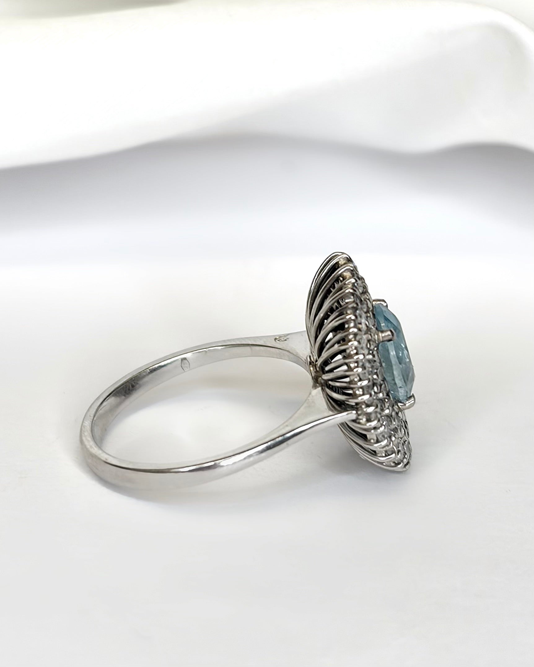 “Deva” Daisy Ring with a 1.60-carat Aquamarine and 0.96 Carat of Diamonds, 5.82 g
