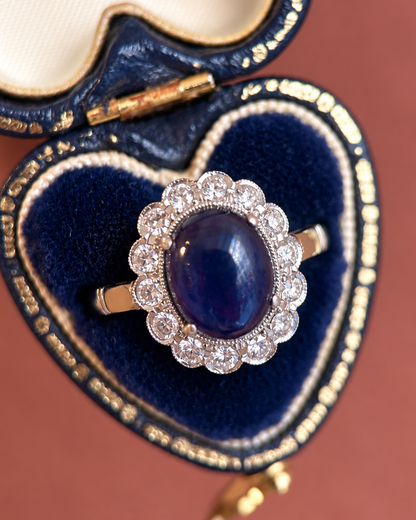 “Patricia” Marguerite ring with a 5.25-carat cabochon sapphire and 0.42-carat diamonds