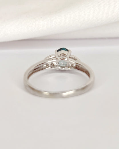 Anillo Trilogía Topacio Azul 0,73 quilates y Diamantes "Ciruela"