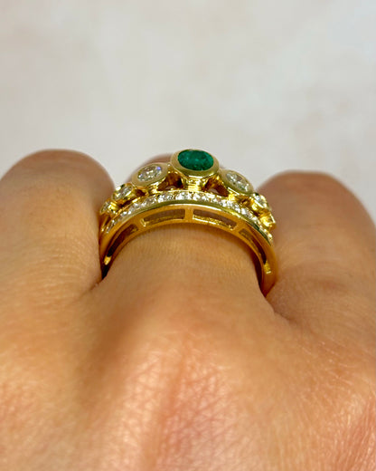 Anillo rígido con esmeralda 0,50 quilates, diamantes 0,84 quilates y oro 6,38 g "Amanda"