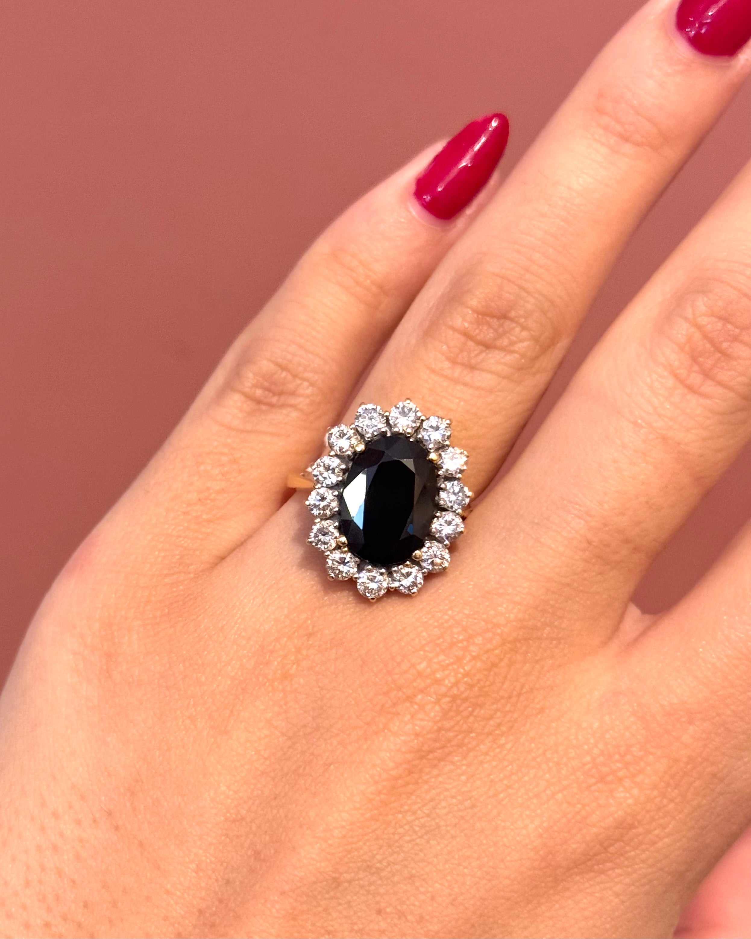 “Eleanore” Marguerite ring with a 5.60-carat sapphire and 1.12 carats of diamonds, 7.06 g