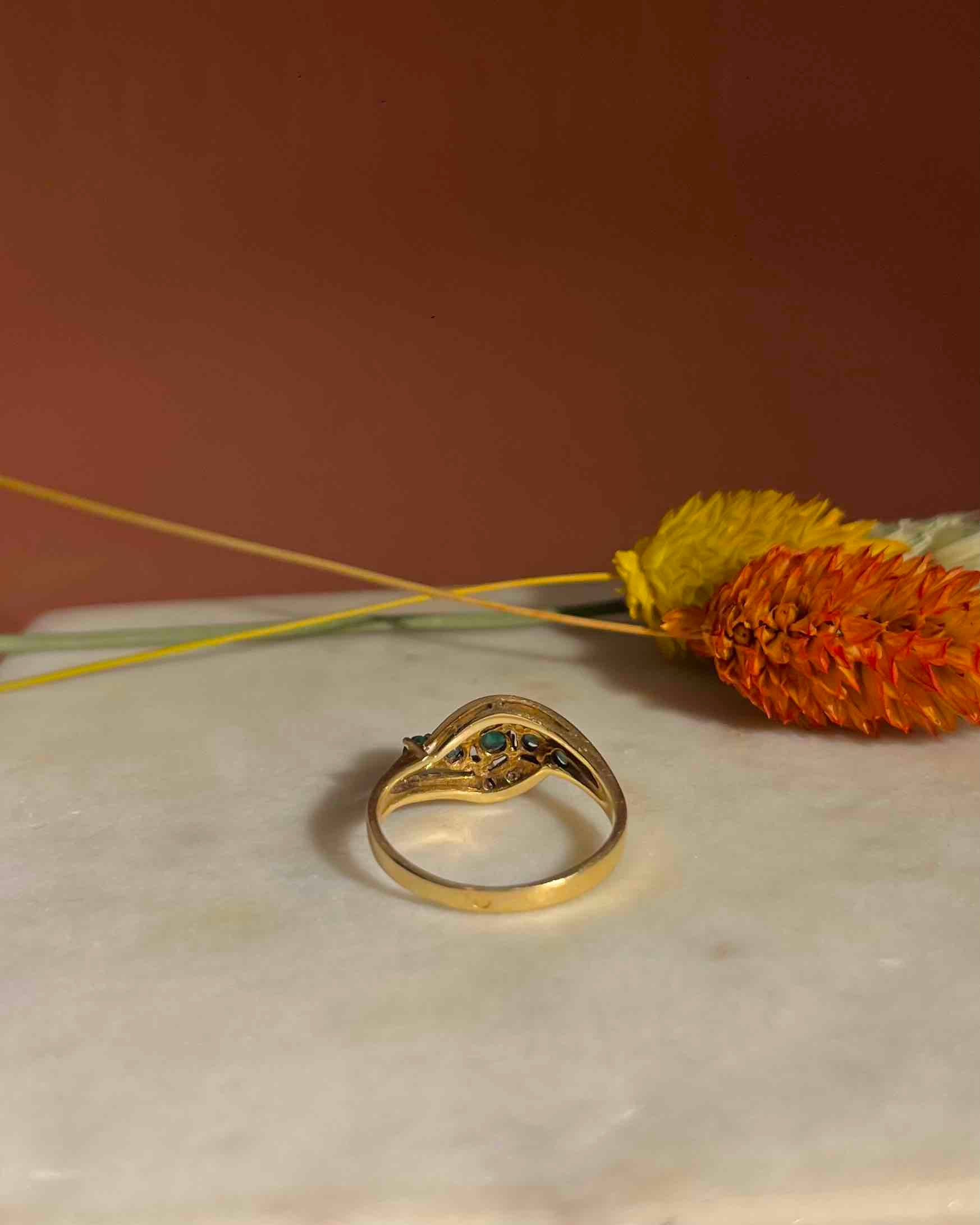 "Servane" emerald and diamond river ring