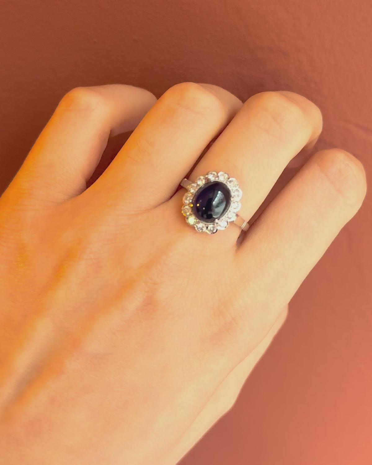 “Patricia” Marguerite ring with a 5.25-carat cabochon sapphire and 0.42-carat diamonds