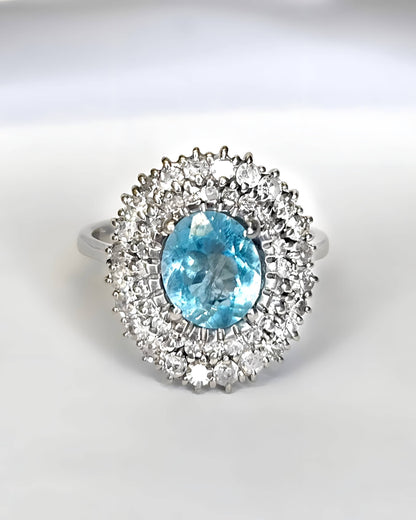 “Deva” Daisy Ring with a 1.60-carat Aquamarine and 0.96 Carat of Diamonds, 5.82 g