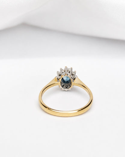 Anillo margarita de topacio de 0,43 quilates y diamantes «Isabelle»