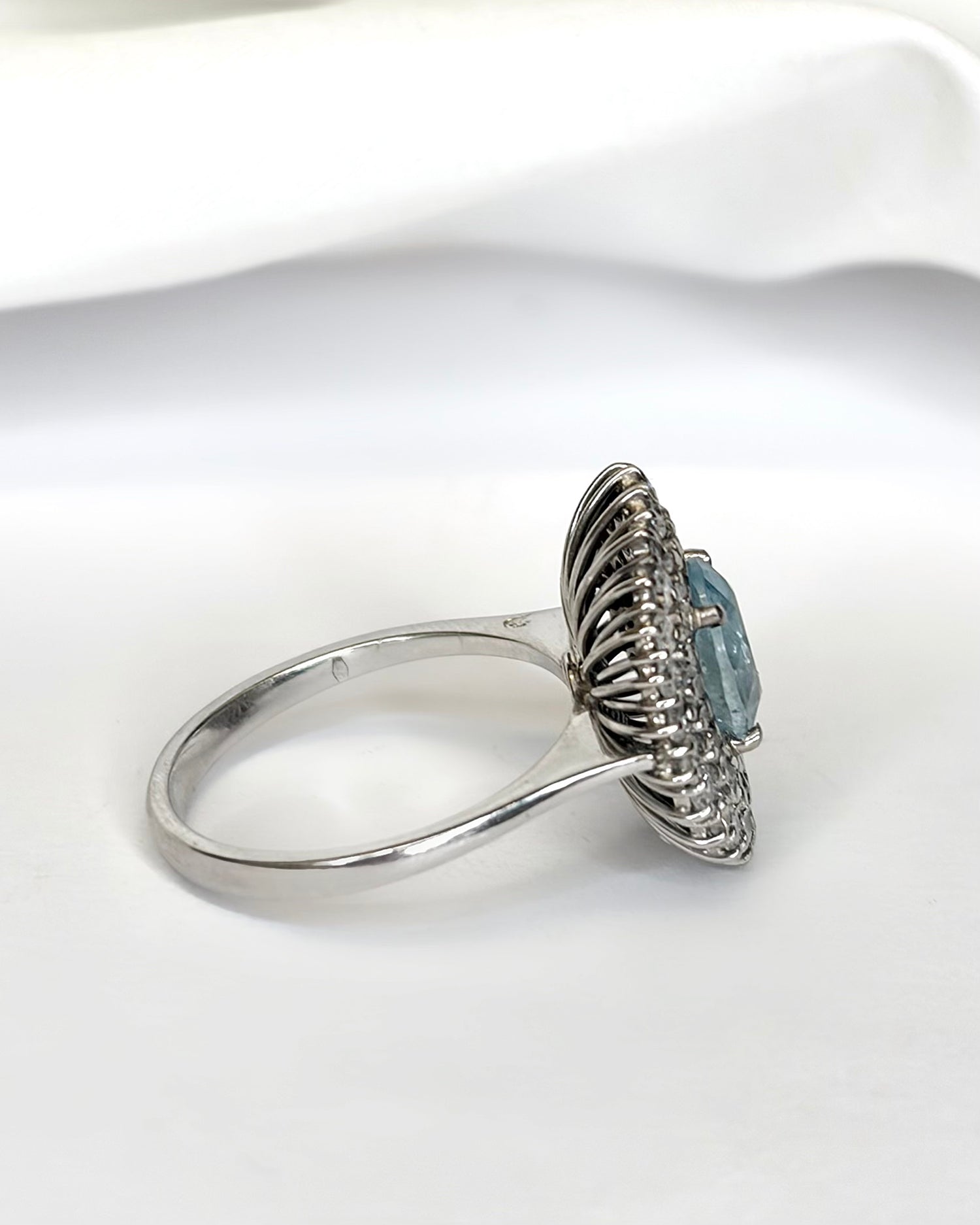 “Deva” Daisy Ring with a 1.60-carat Aquamarine and 0.96 Carat of Diamonds, 5.82 g